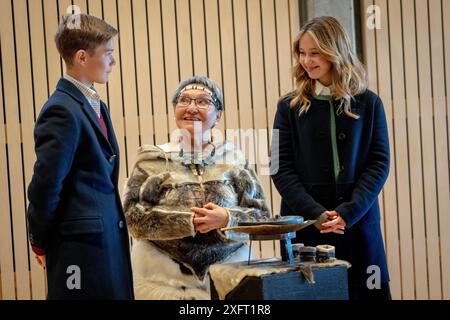 Nuuk, Groenland. 04th July, 2024. Prince Vincent and Princess Josephine help to light a traditional Greenlandic blubber lamp at an official reception in the City Council Hall at the Town Hall in Nuuk in Greenland, Thursday, July 4, 2024. The royal couple officially visit Greenland from June 29 to July 6, 2024. The visit begins in Disko Bay and the royal couple then travels with Dannebrog south along Greenland's west coast. (Photo: Ida Marie Odgaard/Ritzau Scanpix) Credit: Ritzau/Alamy Live News Stock Photo