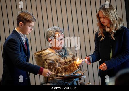 Nuuk, Groenland. 04th July, 2024. Prince Vincent and Princess Josephine help to light a traditional Greenlandic blubber lamp at an official reception in the City Council Hall at the Town Hall in Nuuk in Greenland, Thursday, July 4, 2024. The royal couple officially visits Greenland from June 29 to July 6, 2024. The visit begins in Disko Bay and the royal couple then travels with Dannebrog south along Greenland's west coast. (Photo: Ida Marie Odgaard/Ritzau Scanpix) Credit: Ritzau/Alamy Live News Stock Photo