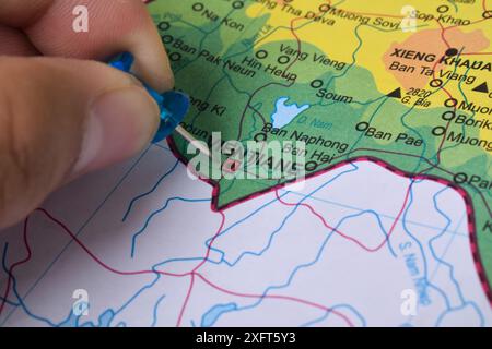 Pin on Vientiane Laos of the World Map. Close up and selective focus. Travel concept Stock Photo