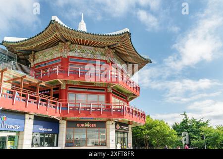 Busan, South Korea - October 7, 2017: Wonderful view of octagonal pavilion on blue sky background at Yongdusan Park. Stock Photo