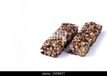 Healthy Muesli bars with nuts and black chocolate isolated on white background Stock Photo
