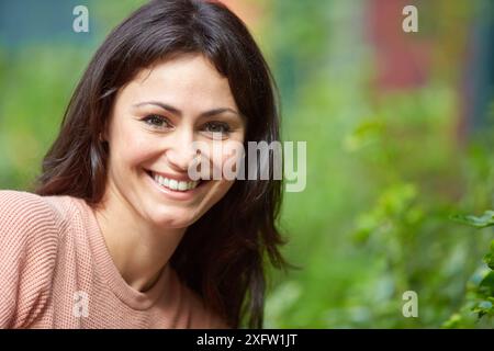 35 year old woman in a park. Donostia. San Sebastian. Gipuzkoa. Basque Country, Spain. Stock Photo