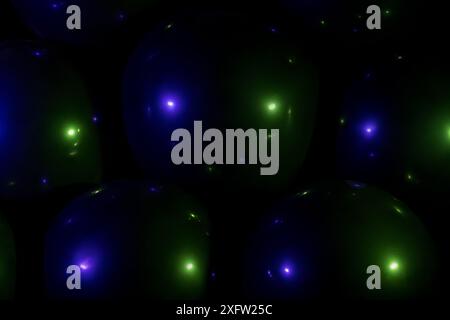 Black balloons in purple and green neon light Halloween party background Stock Photo