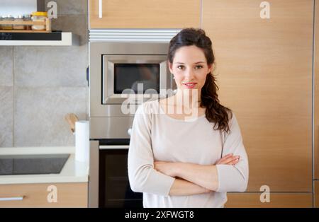 Young couple in kitchen Stock Photo