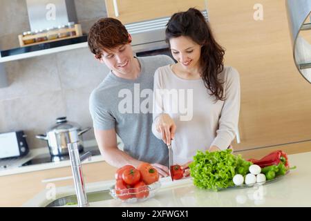 Young couple in kitchen Stock Photo