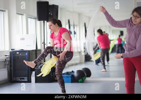 Women in sportswear practicing dance at studio Stock Photo