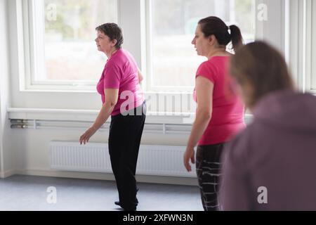 Women in sportswear practicing at dance studio Stock Photo