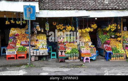 Fresh fruits on display at market stalls Stock Photo