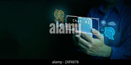 Chat with Ai. A man using chatbot application technology to communicate with artificial intelligence on a virtual screen via his smartphone Stock Photo