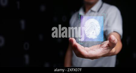 Digital fingerprint for cybersecurity technology. A man using his biometric fingerprint to access his personal data or cyber security. Safe and secure Stock Photo
