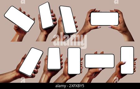 Black hands holding modern smartphones with blank screens on a beige background. Perfect for presenting mobile apps, websites, and technology-related Stock Photo