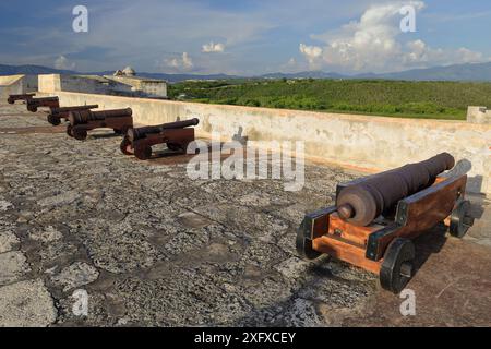 469-Rusty antique cannons battery on the Santisima Trinidad-Holy Trinity platform, Castillo San Pedro del Morro Castle north bulwark. Santiago-Cuba- Stock Photo