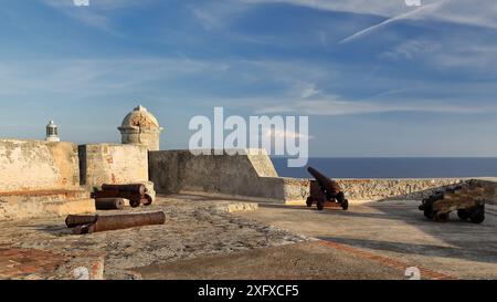 470-Rusty antique cannons battery on the Santisima Trinidad-Holy Trinity platform, Castillo San Pedro del Morro Castle south bulwark. Santiago-Cuba, Stock Photo