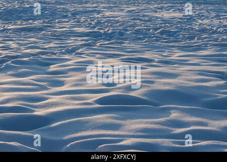 Footsteps on snow. Scenic view of snow covered land. Stock Photo