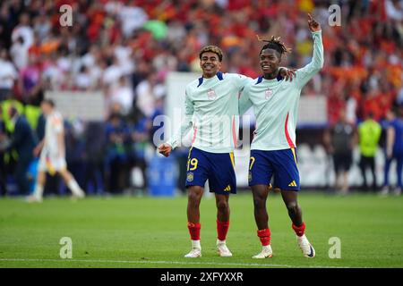 Spain's Nico Williams (left) and Lamine Yamal celebrate after winning