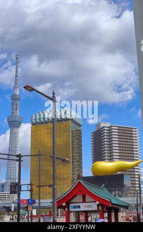 Tokyo street with sky tree and asahi beer hall in Sumida, Tokyo, Japan Stock Photo