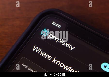 Perplexity.ai logo seen in its website on an iPhone screen. Perplexity AI is a research and conversational search engine powered by AI chatbots. Stock Photo