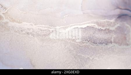 A close-up photograph of a white and gray abstract ink swirl with delicate texture Stock Photo