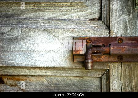 The door latch looks old and interesting. Stock Photo