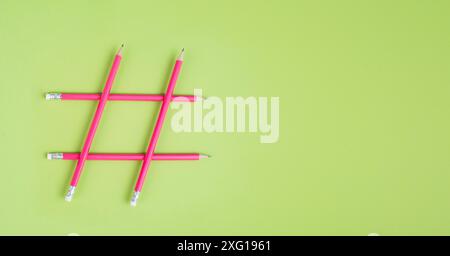 Hashtag made from pencils, social media communication, influencer and