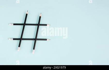 Hashtag made from pencils, social media communication, influencer and