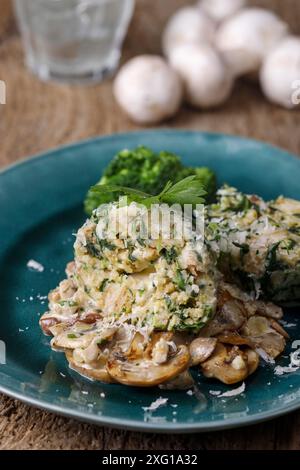 Stuffed dumplings with mushroom sauce Stock Photo