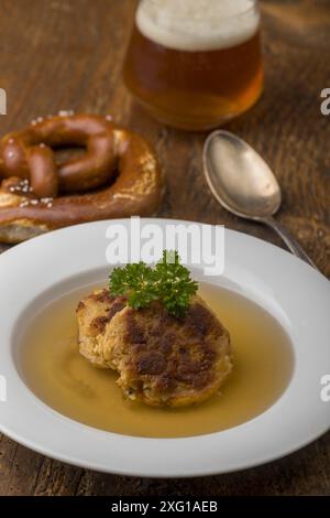 Austrian cheese dumplings in broth Stock Photo