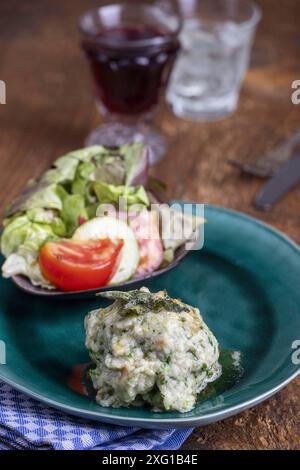 Rustic spinach dumpling with salad Stock Photo