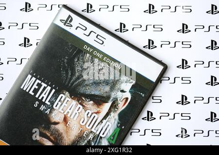 KYIV, UKRAINE - JUNE 26, 2024 Metal Gear Solid Delta Snake Eater PS5 video game disc box for console gaming. Popular video game disc close up Stock Photo