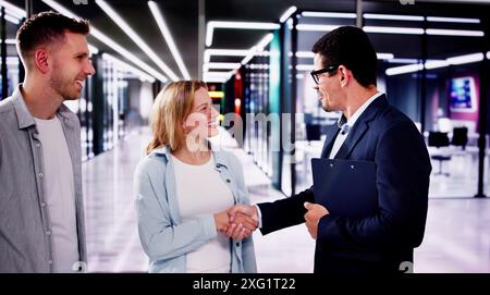 Investment Proposal Meeting with Real Estate Agent for Business Opportunity in Future Commercial Building Design Project Stock Photo