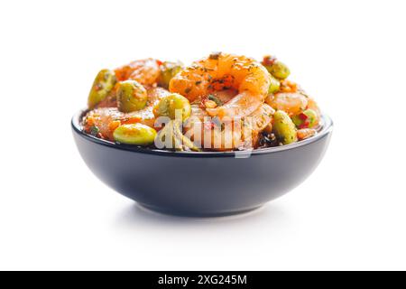Fresh salad with shrimps and edamame soybeans in bowl isolated on a white background. Stock Photo