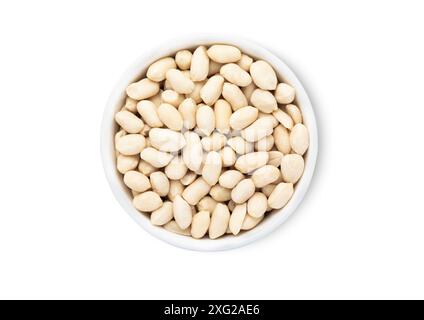 Bowl plate with healthy white shelless peanuts nuts isolated on white background. Stock Photo