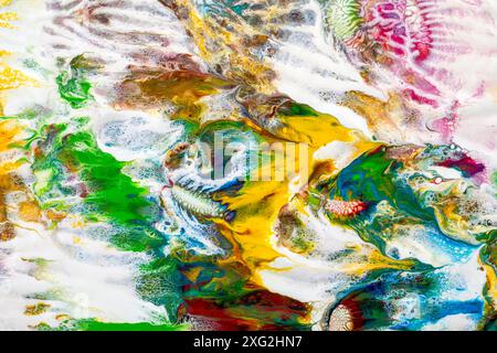 Illustration of marbled, watery texture with organic and multicolored waves created with acrylic paint in primary colors perfect for backgrounds and t Stock Photo