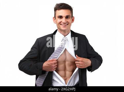 Handsome fit man with six-pack abs in trendy working suit, brag about perfect body image Stock Photo