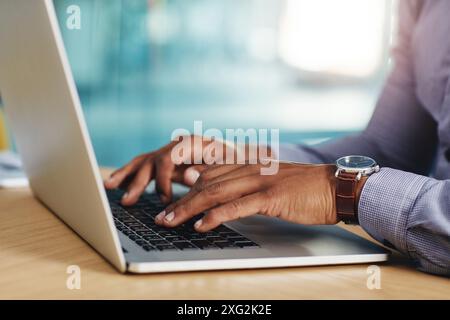 Businessman, desk and hands typing on laptop for productivity, planning schedule and admin in office. Male attorney, fingers and computer for web Stock Photo