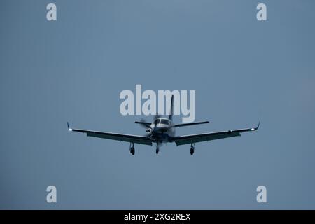 Single-engined turboprop airplane in the cloudy sky Stock Photo - Alamy