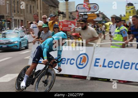 Mark Cavendish of Astana Qazaqstan Team rides into Gevrey-Chambertin in the individual time trial on stage 7 of the 2024 Tour de France Credit: Dominic Dudley/Alamy Live News Stock Photo