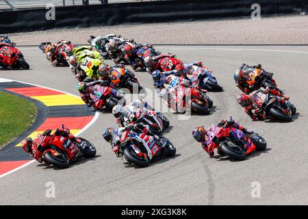 Hermsdorf, Germany. 06th July, 2024. Hermsdorf: Moto GP Sachsenring 2024 on July, 6, 2024, (Photo by Juergen Tap), Start, Sprintrace 1 Francesco Bagnaia (ITA), Ducati, Ducati Lenovo Team 88 Miguel Olivera (POR), Aprilia, Trackhouse Racing 89 Jorge Martin (ESP), Ducati, Prima Pramac Racing Credit: dpa/Alamy Live News Stock Photo