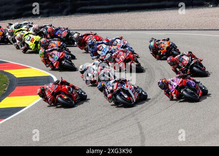 Hermsdorf, Germany. 06th July, 2024. Hermsdorf: Moto GP Sachsenring 2024 on July, 6, 2024, (Photo by Juergen Tap), Start, Sprintrace 1 Francesco Bagnaia (ITA), Ducati, Ducati Lenovo Team 88 Miguel Olivera (POR), Aprilia, Trackhouse Racing 89 Jorge Martin (ESP), Ducati, Prima Pramac Racing Credit: dpa/Alamy Live News Stock Photo