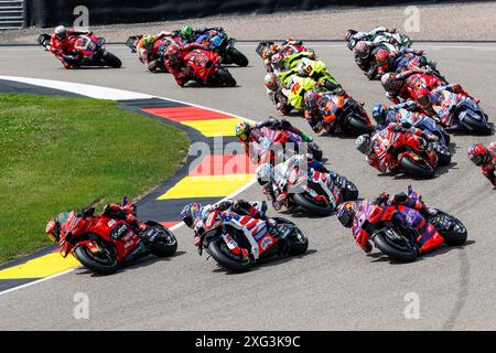 Hermsdorf, Germany. 06th July, 2024. Hermsdorf: Moto GP Sachsenring 2024 on July, 6, 2024, (Photo by Juergen Tap), Start, Sprintrace 1 Francesco Bagnaia (ITA), Ducati, Ducati Lenovo Team 88 Miguel Olivera (POR), Aprilia, Trackhouse Racing 89 Jorge Martin (ESP), Ducati, Prima Pramac Racing Credit: dpa/Alamy Live News Stock Photo