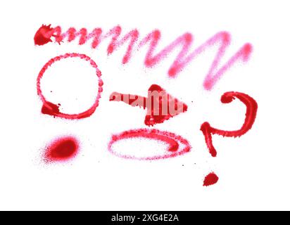 Different symbols made with red spray paint isolated on white, top view Stock Photo