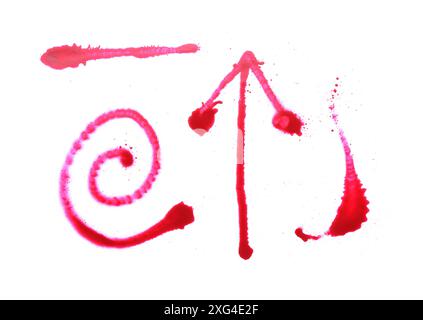 Different symbols made with red spray paint isolated on white, top view Stock Photo