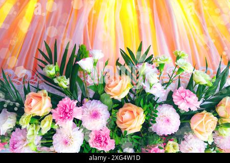 Beautiful flowers decorate the scene in the wedding. Stock Photo