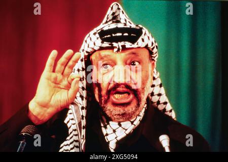 Yasser ARAFAT (Mohammed Yasser Abdel Rahman Abdel Raouf Arafat al-Qudwa), (*24 August 1929, +11 November 2004), was a Palestinian leader. He was Chairman of the Palestine Liberation Organization (PLO), President of the Palestinian National Authority (PNA), and leader of the Fatah political party and former paramilitary group, which he founded in 1959. Picture taken in May 1988 in Tripolis, Libya. Stock Photo
