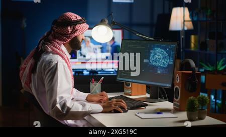 Knowledgeable data scientist updating neural networks, writing complex binary code scripts. Certified teleworking freelancer in home office uses digital device programming to upgrade AI Stock Photo
