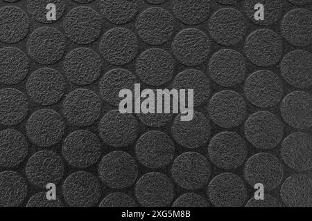 Black textured vinyl background. Dot pattern. Full frame Stock Photo