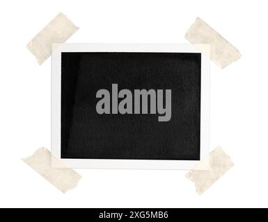 Blank Vintage instant photo frame with brown tape isolated on white background Stock Photo