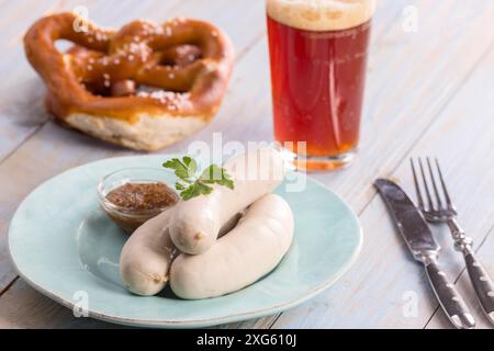 Bavarian white sausages with pretzel Stock Photo