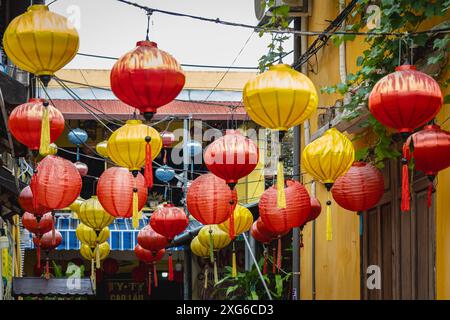 Laterns all over the streets in Hoi An. Hoi An Ancient town houses. Colorful buildings with festive silk lanterns. UNESCO heritage site. Vietnam. Fest Stock Photo