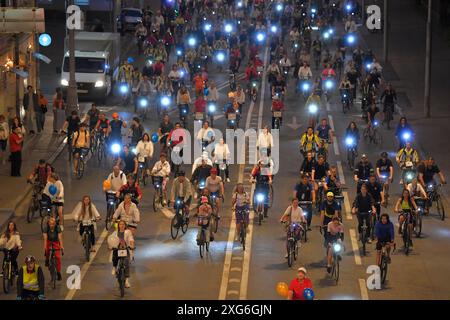 Moscow, Russia. 6th July, 2024. People take part in a night bicycle festival in Moscow, Russia, July 6, 2024. Thousands of people took part in the bicycle ride through the central streets of Moscow during the festival. Credit: Alexander Zemlianichenko Jr/Xinhua/Alamy Live News Stock Photo